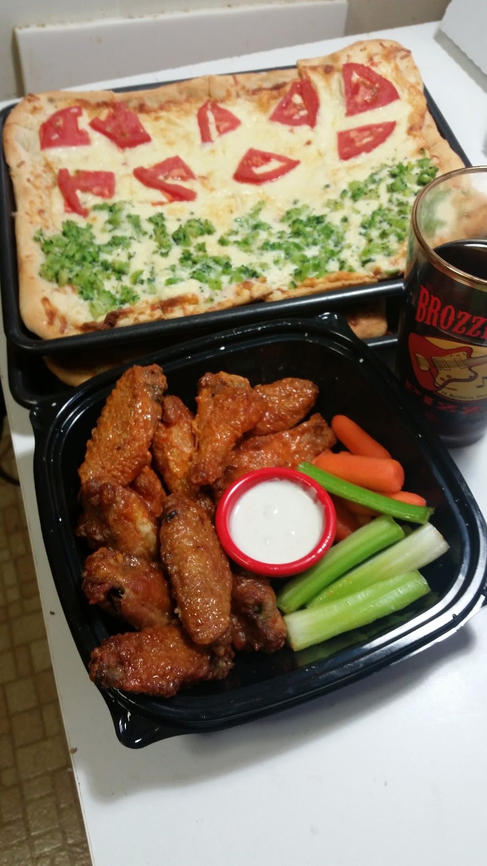 Takeout menu for pizza, wings, and meatballs.